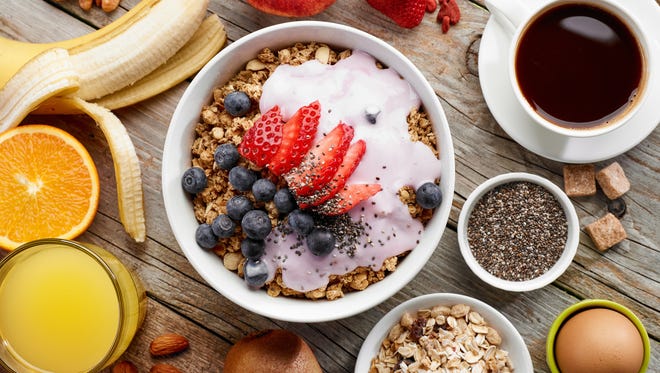 Avoid sugary foods for breakfast and opt for whole grains, proteins and eggs.  top view of healthy breakfast ingredients, selective focus
