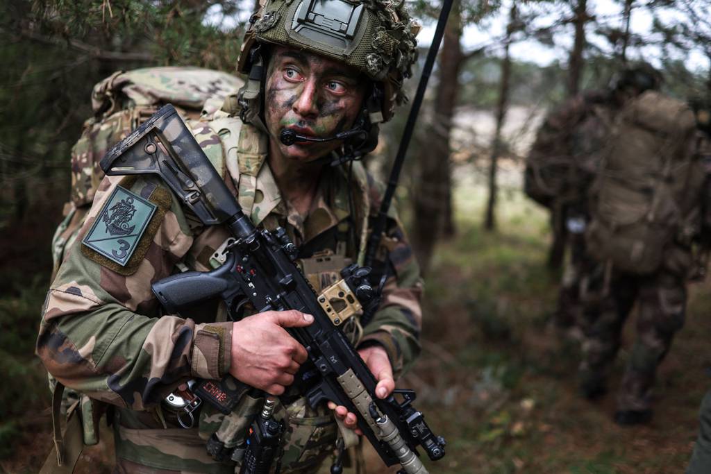 A soldier walks from one point to another during a land navigation course at Camp Williams, Utah, April 15, 2021.