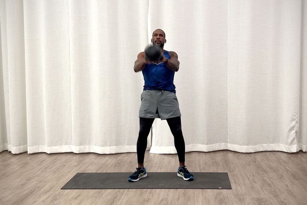 Kettlebell workout for beginners, Jeffers practicing the Dead Stop Swing exercise