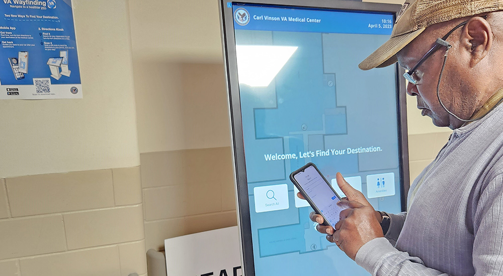 Man using GPS app on phone; Dublin VA