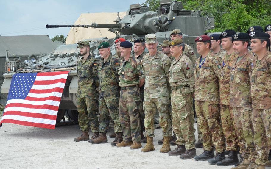 General James Mcconville, Army Chief Of Staff, Looking Right, Stands With Major General James Martin, Commander Of The British 3Rd Division, And Troops From Britain, Germany, D Italy And France During A Multinational Training Exercise Thursday, April 20, 2023, At Fort Hood, Texas.