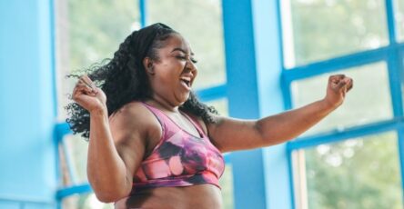 A woman enjoying dancing at the gym