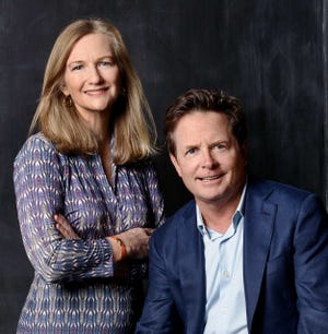 Deborah W. Brooks, Ceo Of The Michael J. Fox Foundation, With Actor Michael J. Fox.