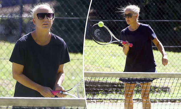 Radio star Jackie 'O' Henderson breaks a sweat on the tennis court after losing weight