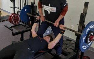 Peter Hubbard, 85, spots his wife, Nona, 61, during a recent weightlifting workout. The two will compete in the Powerlifting America New Hampshire State Championship at Lift Free or Die Gym in Dover beginning at 9 a.m.